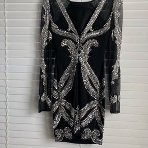 Claudine dress in size 0. Black with silver beads. V shaped back